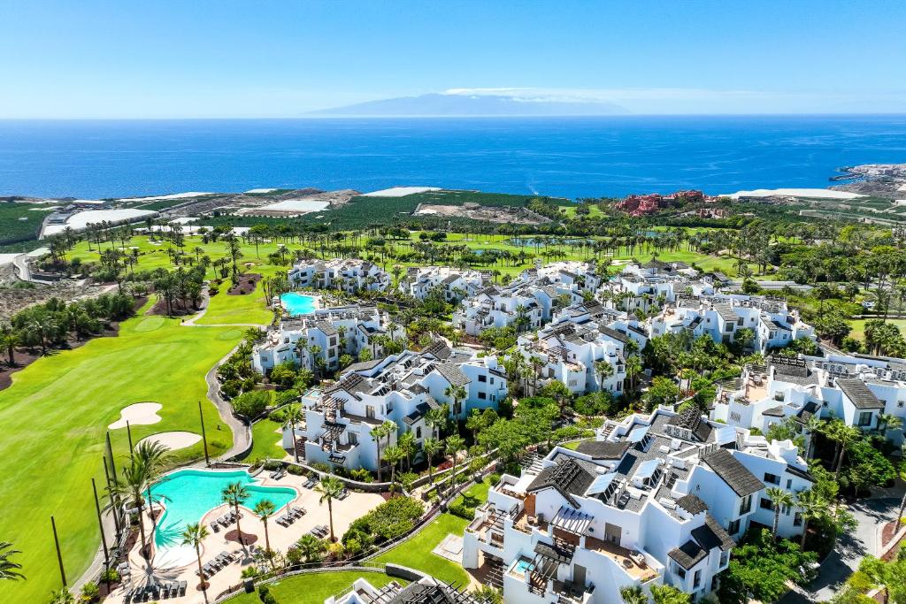 an aerial view of a resort with the ocean at Las Terrazas de Abama Suites in Guía de Isora