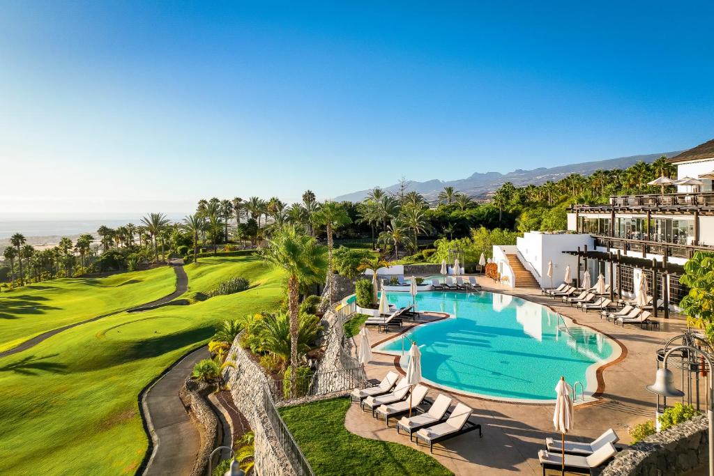 an aerial view of a resort with a swimming pool at Las Terrazas de Abama Suites in Guía de Isora