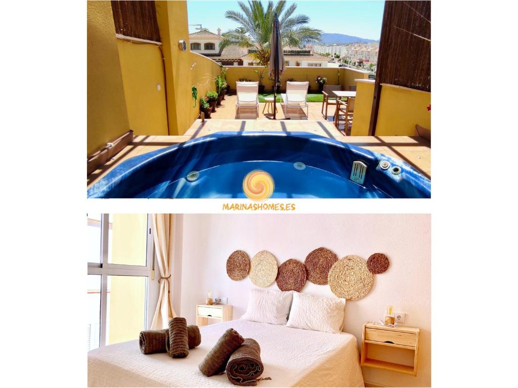 a hotel room with a swimming pool and a bedroom at Agua Marinas - Tu ático con Jacuzzi Privado! in Vera