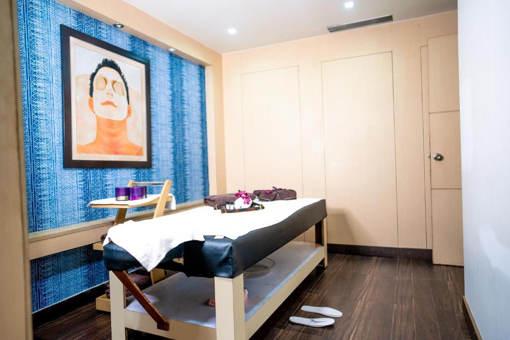 Postel nebo postele na pokoji v ubytování Hotel Pal Heights