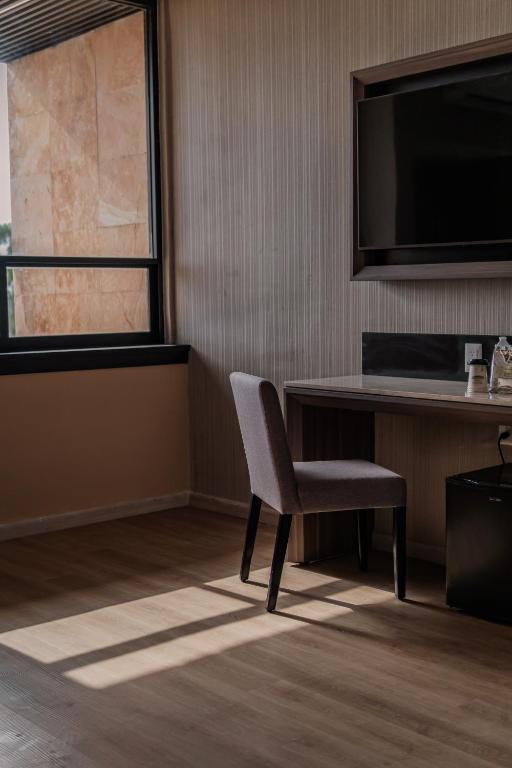 TV a/nebo společenská místnost v ubytování Hotel Kavia Premium - Paseo Montejo