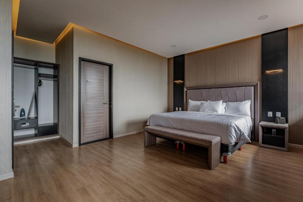 Postel nebo postele na pokoji v ubytování Hotel Kavia Premium - Paseo Montejo