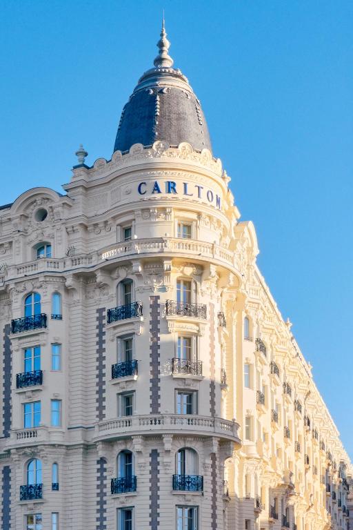 a building with a dome on top of it at Carlton Cannes, a Regent Hotel in Cannes