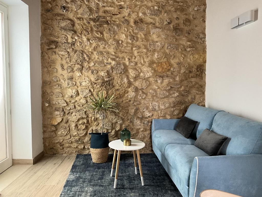 A seating area at Rua 39 fine apartments by Dimore in Sicily
