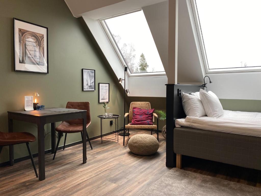 Postel nebo postele na pokoji v ubytování Magnolia House Sollentuna