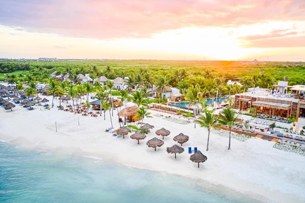 an aerial view of the beach at the excellence punta cana resort at Fairmont Mayakoba Riviera Maya - All Inclusive in Playa del Carmen