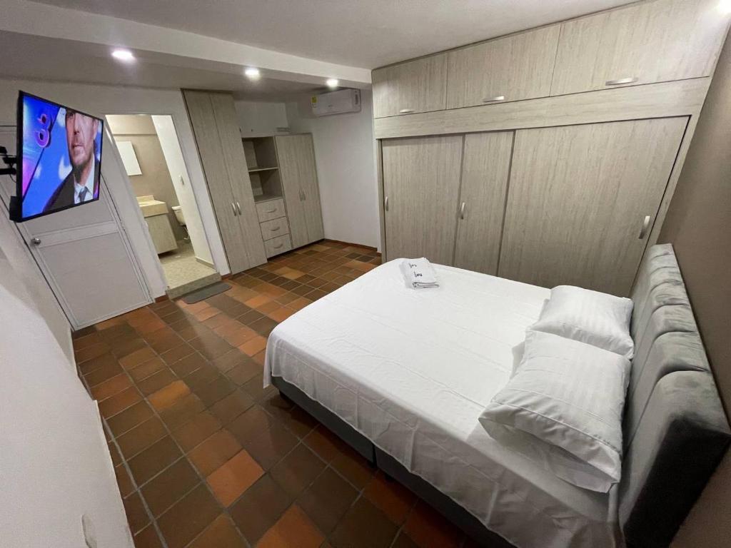 Postel nebo postele na pokoji v ubytování Hotel Valle Central