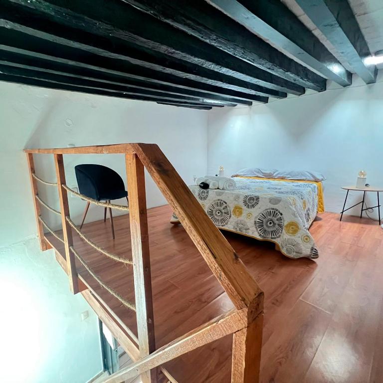 Postel nebo postele na pokoji v ubytování Hostal Luna 49