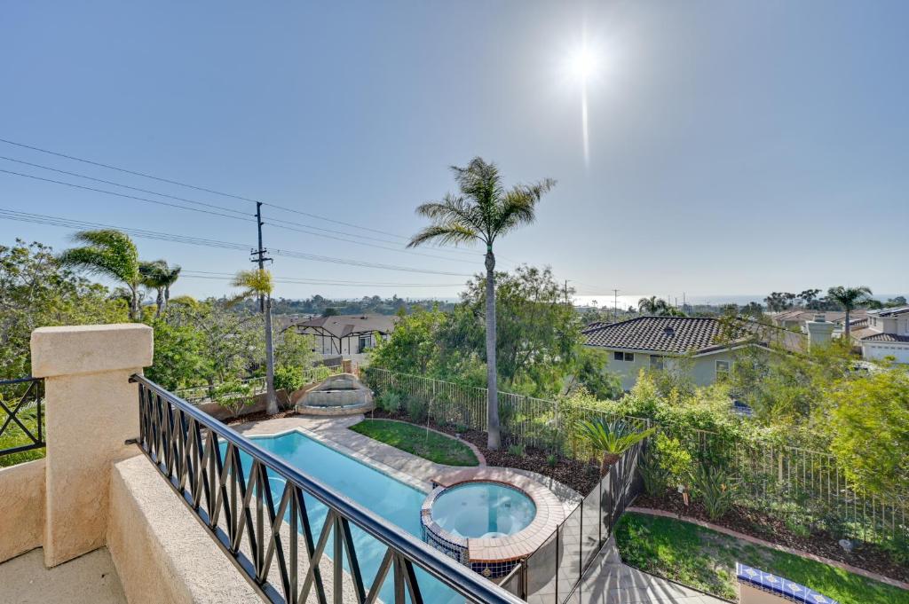 a balcony with a swimming pool and a swimming pool at Luxury Encinitas Vacation Rental with Private Pool in Encinitas