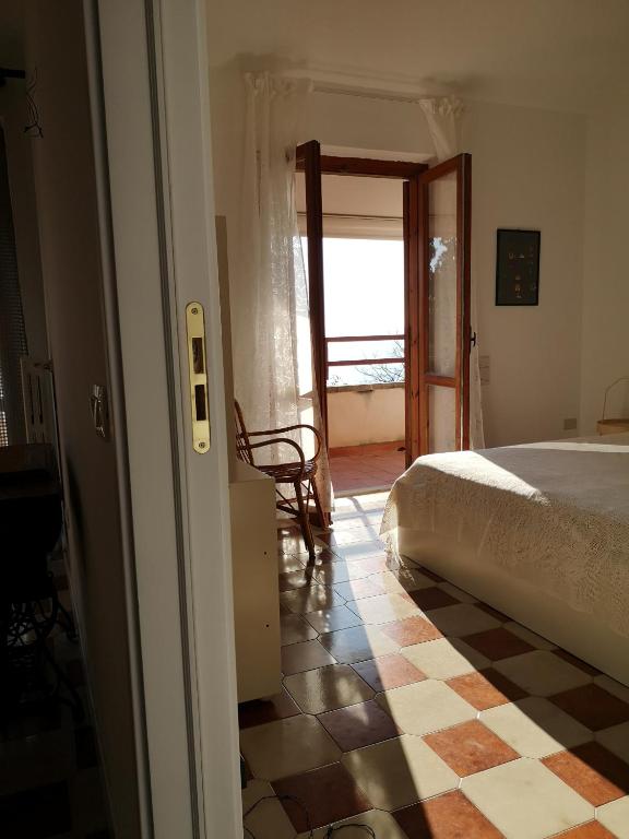 Posteľ alebo postele v izbe v ubytovaní Il Porticato - Affittacamere
