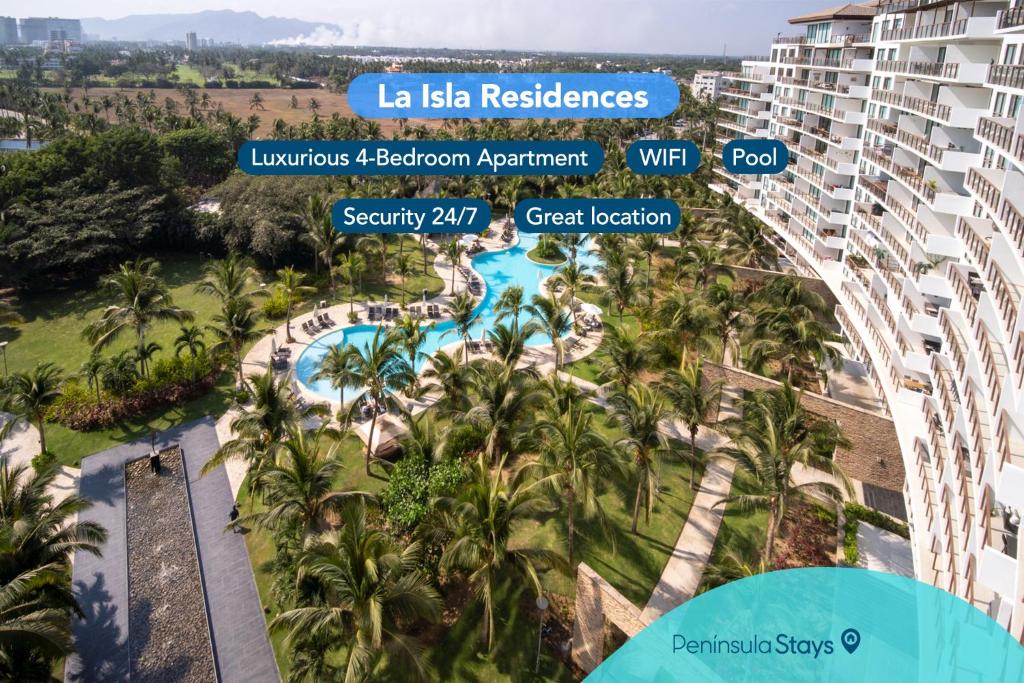 - une vue aérienne sur la piscine du complexe La las Reserve dans l'établissement Beachfront Bliss: Luxurious 4-Bedroom Apartment, à Acapulco