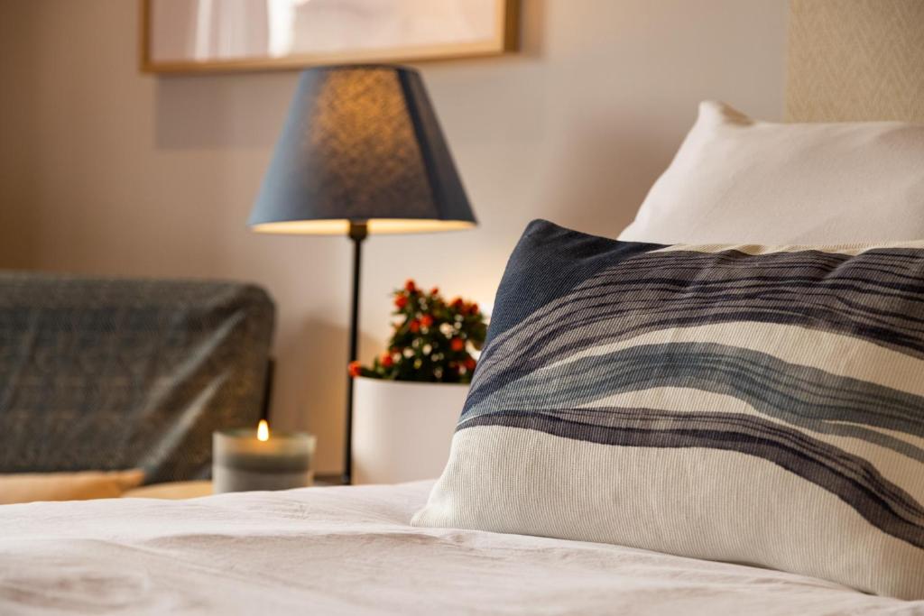 Postel nebo postele na pokoji v ubytování Eco-Hotel Doña Mayor