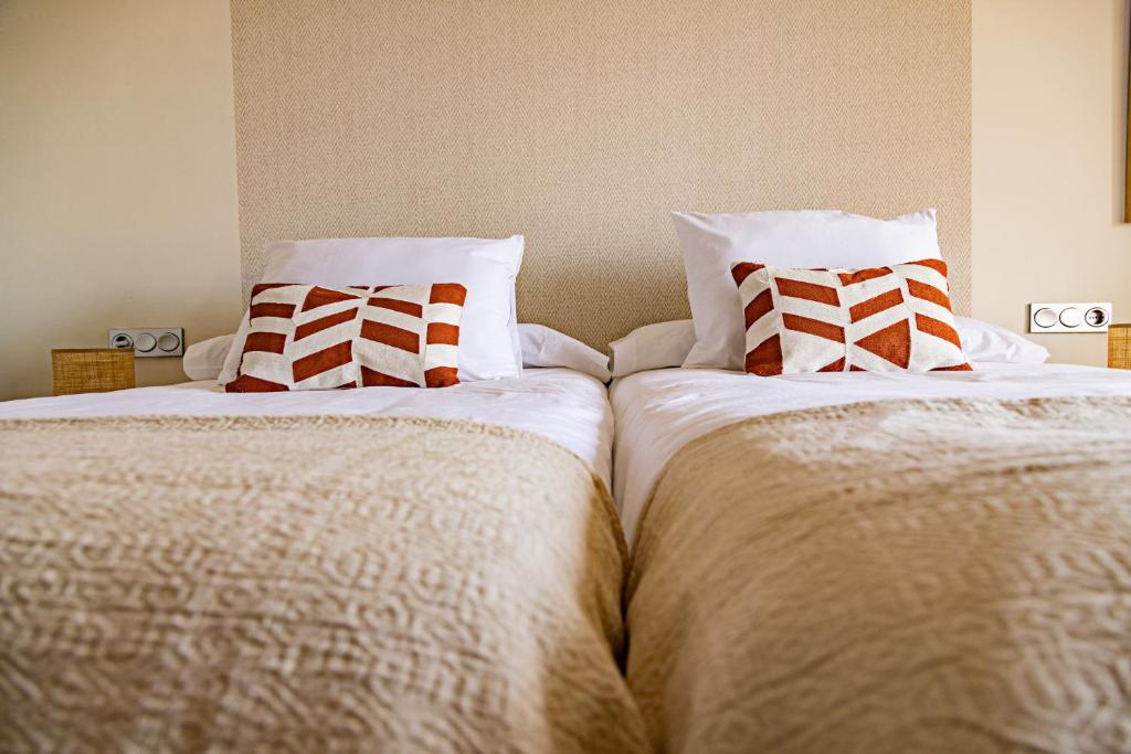 Postel nebo postele na pokoji v ubytování Eco-Hotel Doña Mayor