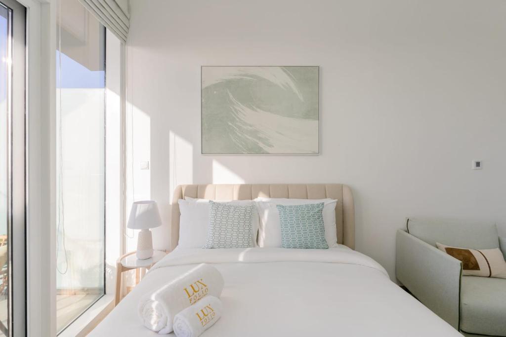 Postel nebo postele na pokoji v ubytování LUXFolio Retreats Bloom Mint Green