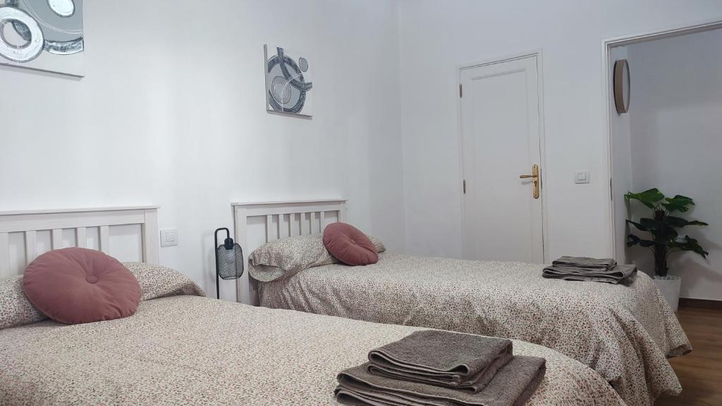 Postel nebo postele na pokoji v ubytování Casa" VISTAS AL TEIDE" mar Piscina privada parking cubierto gratuito en las instalaciones