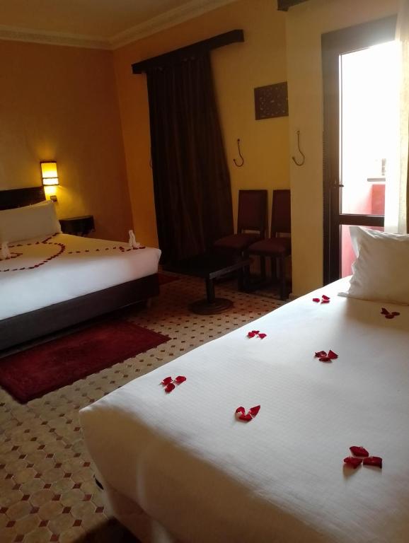 Postel nebo postele na pokoji v ubytování Riad Marrakech By Hivernage
