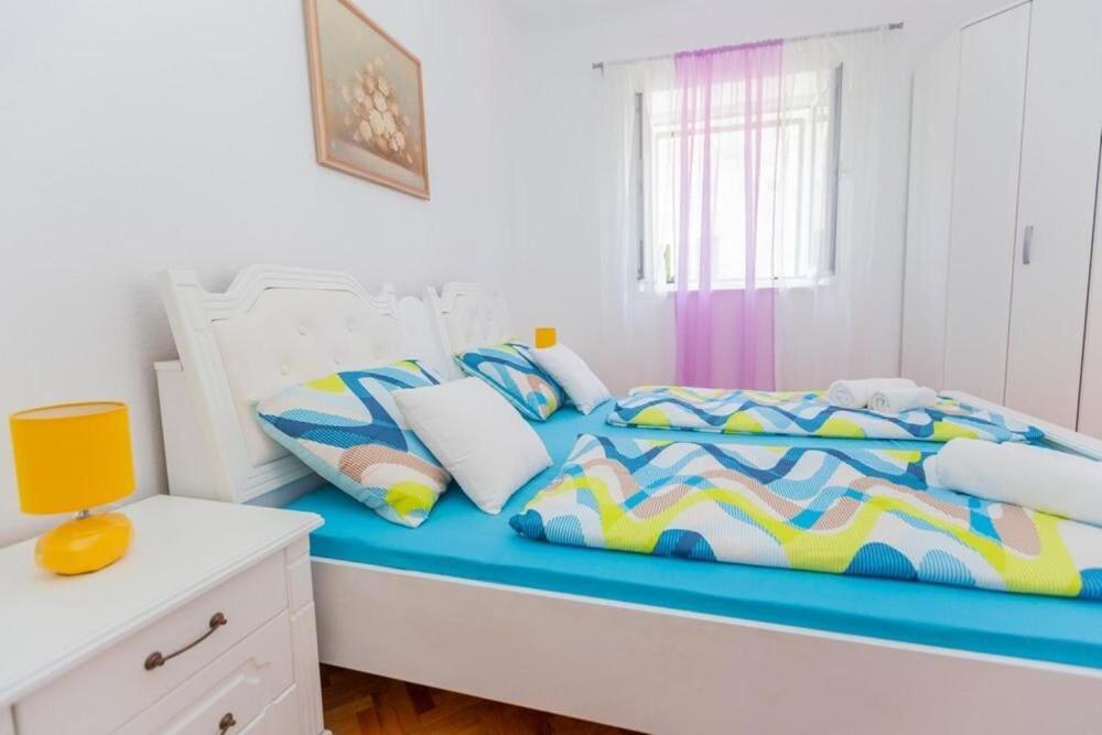 Posteľ alebo postele v izbe v ubytovaní Apartment Roko in Center