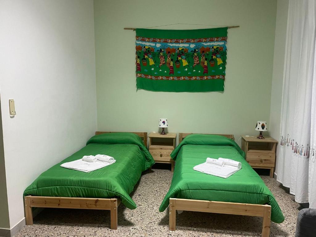 Posteľ alebo postele v izbe v ubytovaní Beteyà Hostel Don Bosco