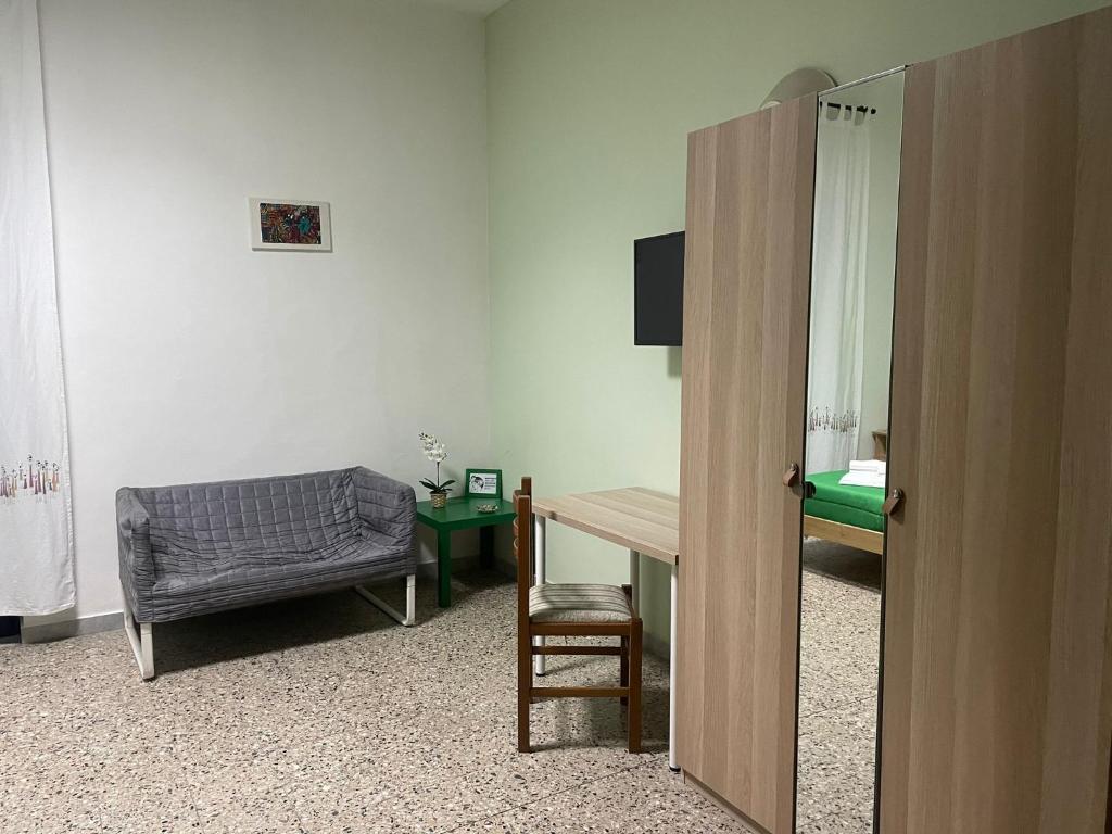 Televízia a/alebo spoločenská miestnosť v ubytovaní Beteyà Hostel Don Bosco