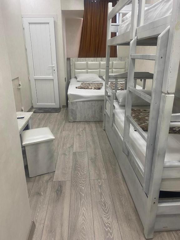 Postel nebo postele na pokoji v ubytování HOTEL N1