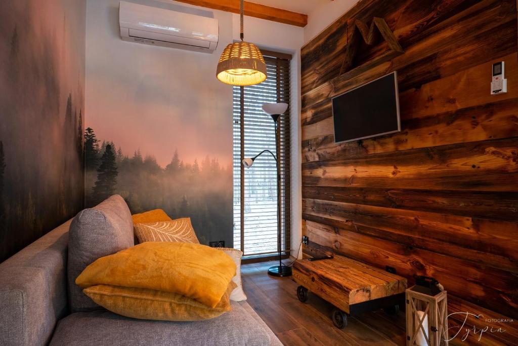 Posedenie v ubytovaní Dziupla House