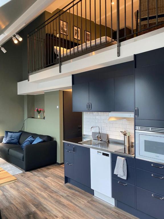 Kuchyň nebo kuchyňský kout v ubytování Magnolia House Sollentuna