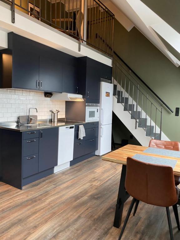 Kuchyň nebo kuchyňský kout v ubytování Magnolia House Sollentuna