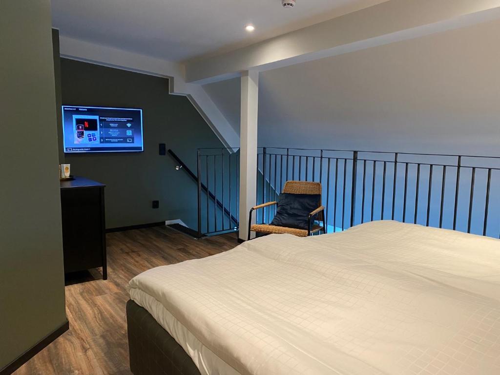 Postel nebo postele na pokoji v ubytování Magnolia House Sollentuna