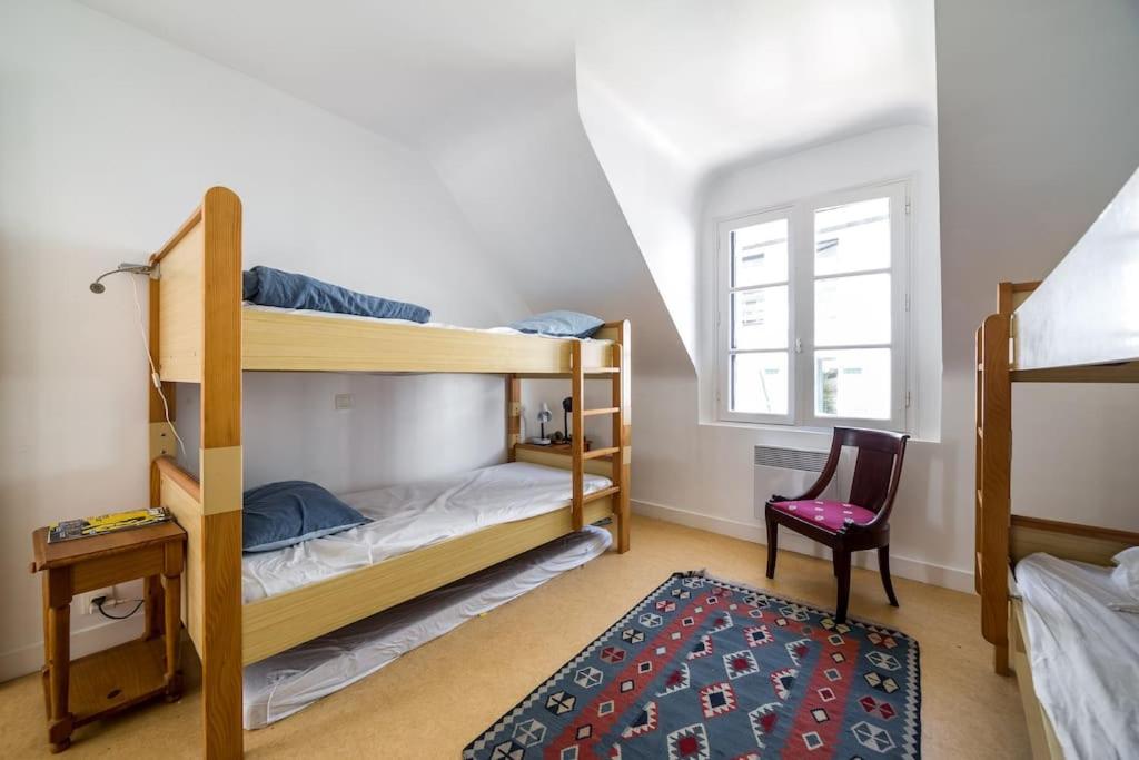 Posteľ alebo postele v izbe v ubytovaní Petite maison bourg de La Trinite sur Mer - 4 à 6 couchages