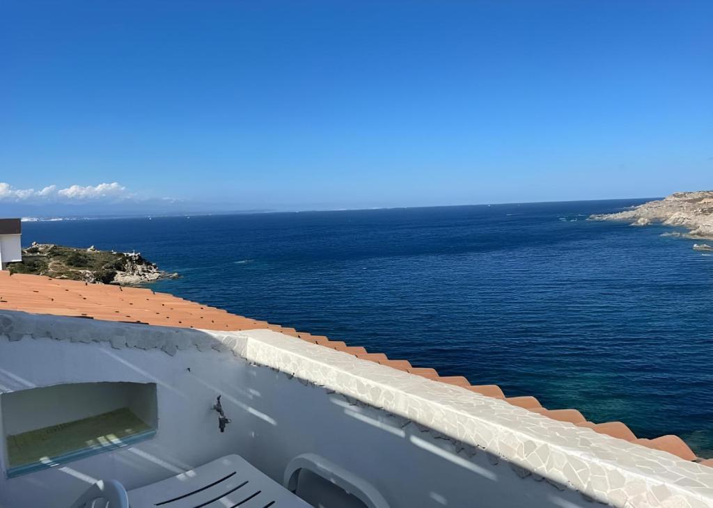 a view of the ocean from a ship at Appartamento La Terrazza al Gallo di Gallura in Santa Teresa Gallura