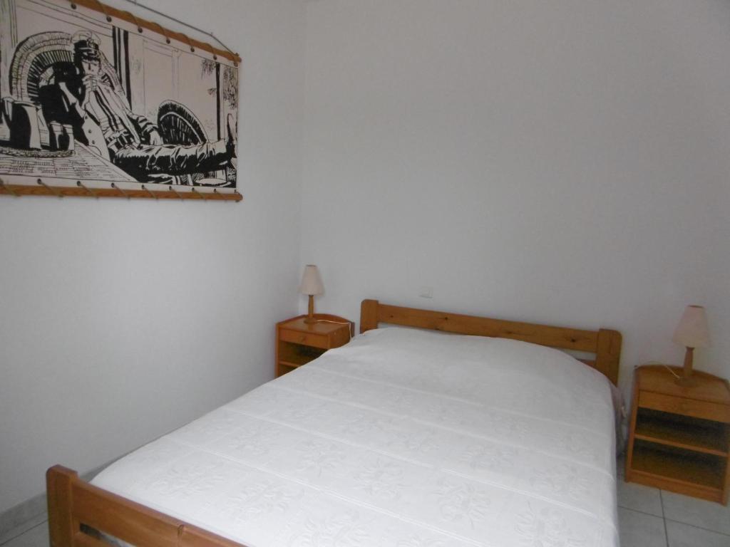Posteľ alebo postele v izbe v ubytovaní Villa NAIA proche mer et foret