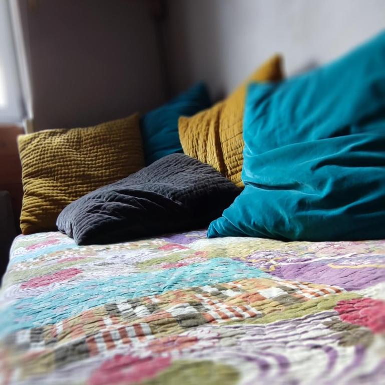Posteľ alebo postele v izbe v ubytovaní La cachette maison de ville
