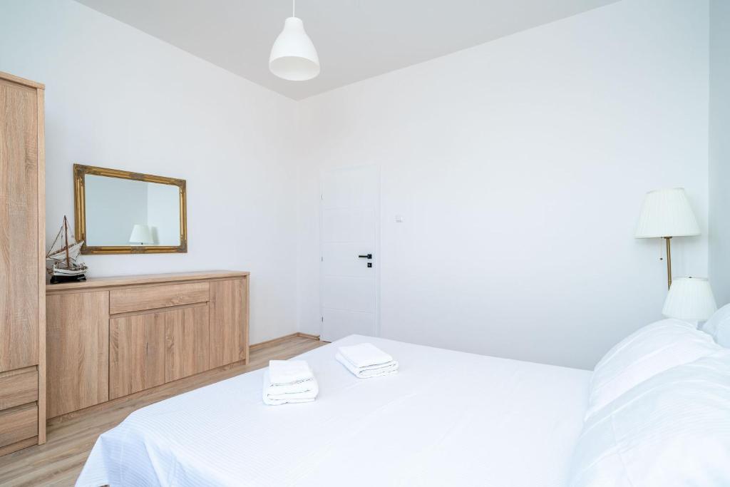 Posteľ alebo postele v izbe v ubytovaní Dubrovnik SEA VIEW MAGNOLIA APARTMENTS
