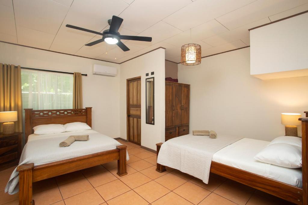 Postel nebo postele na pokoji v ubytování Manzanillo Caribbean Resort