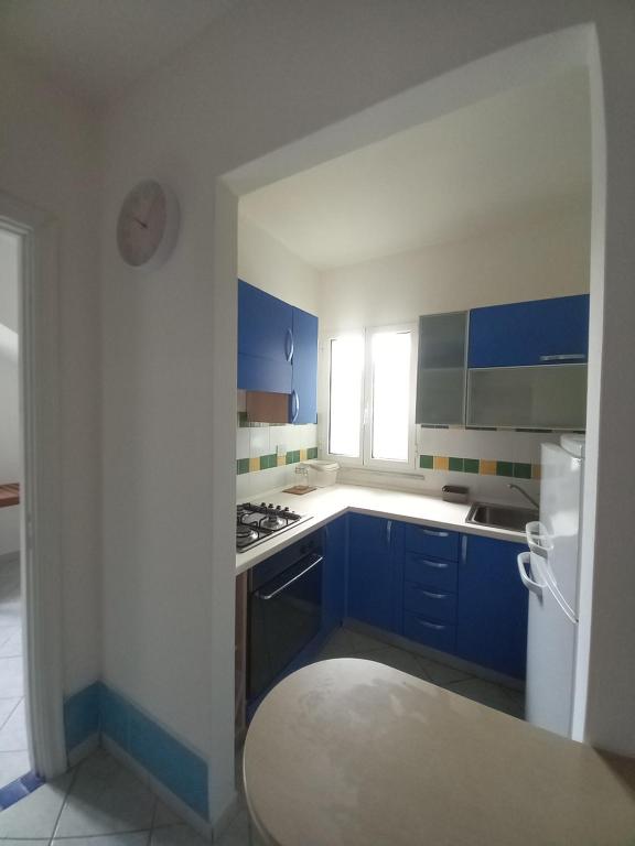 Kuchyň nebo kuchyňský kout v ubytování Villa Acquamarina