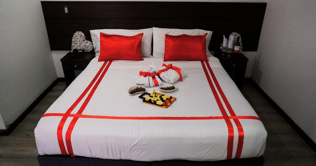 Postel nebo postele na pokoji v ubytování Hotel Expo Hotel Ferial