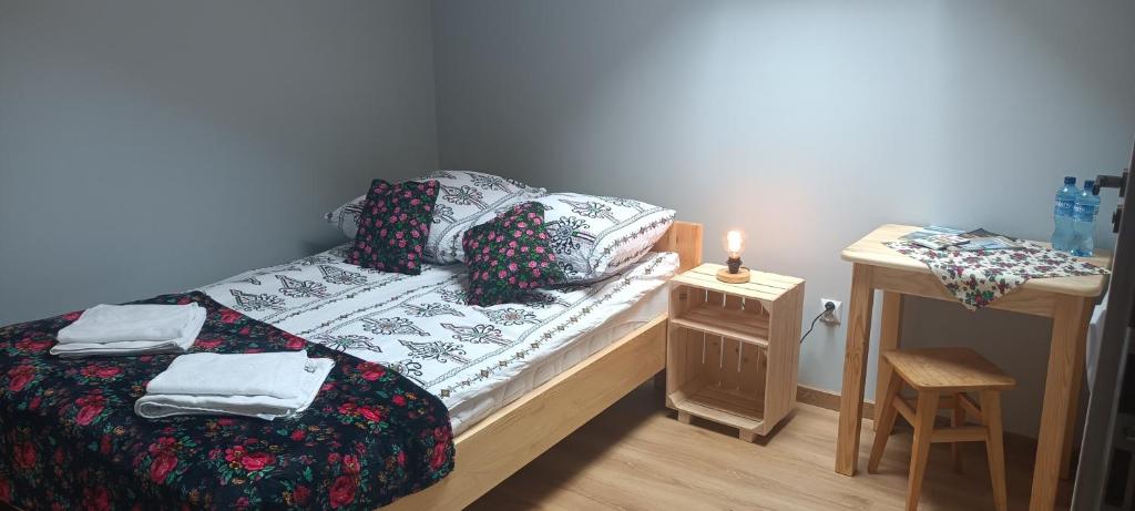 Posteľ alebo postele v izbe v ubytovaní Noclegi przy Skawie