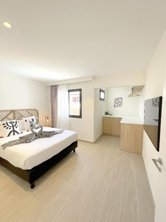 Postel nebo postele na pokoji v ubytování Casahost Bastian Beach