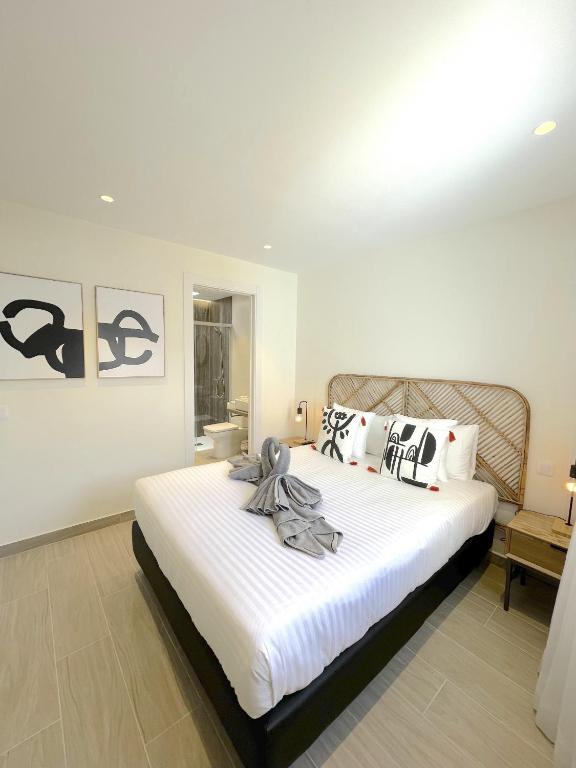 Postel nebo postele na pokoji v ubytování Casahost Bastian Beach