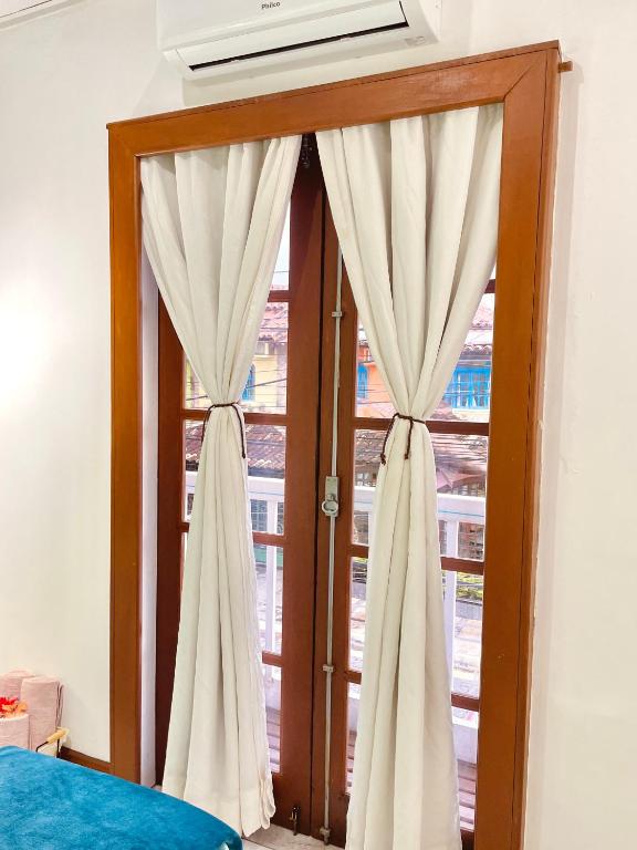 Postel nebo postele na pokoji v ubytování 1 Quarto Pra 2 Búzios