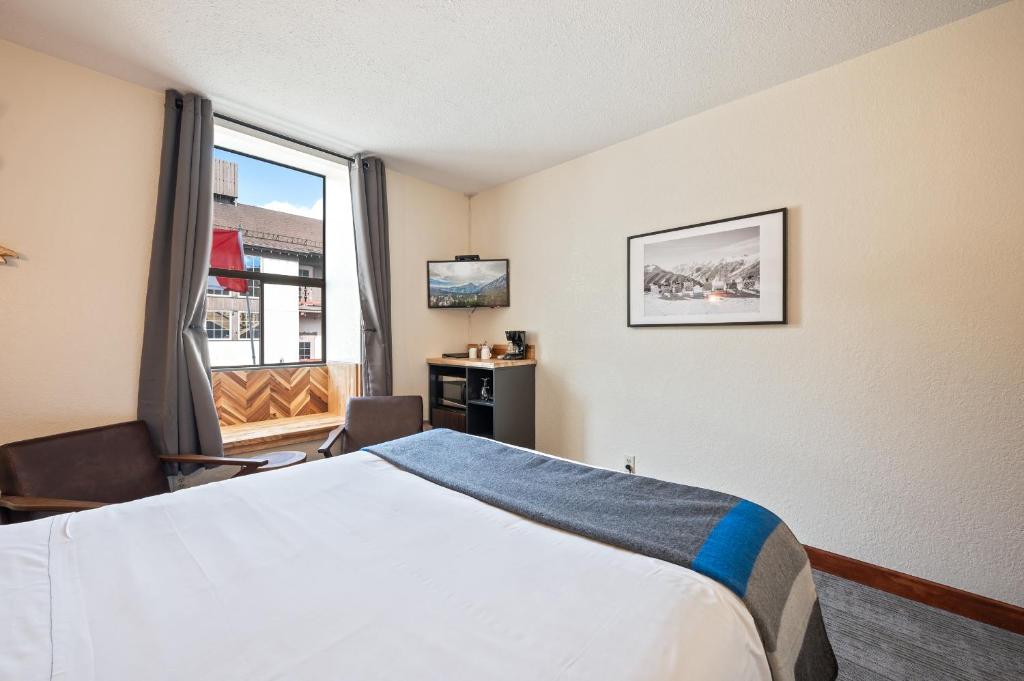 Postel nebo postele na pokoji v ubytování Hotel Leavenworth