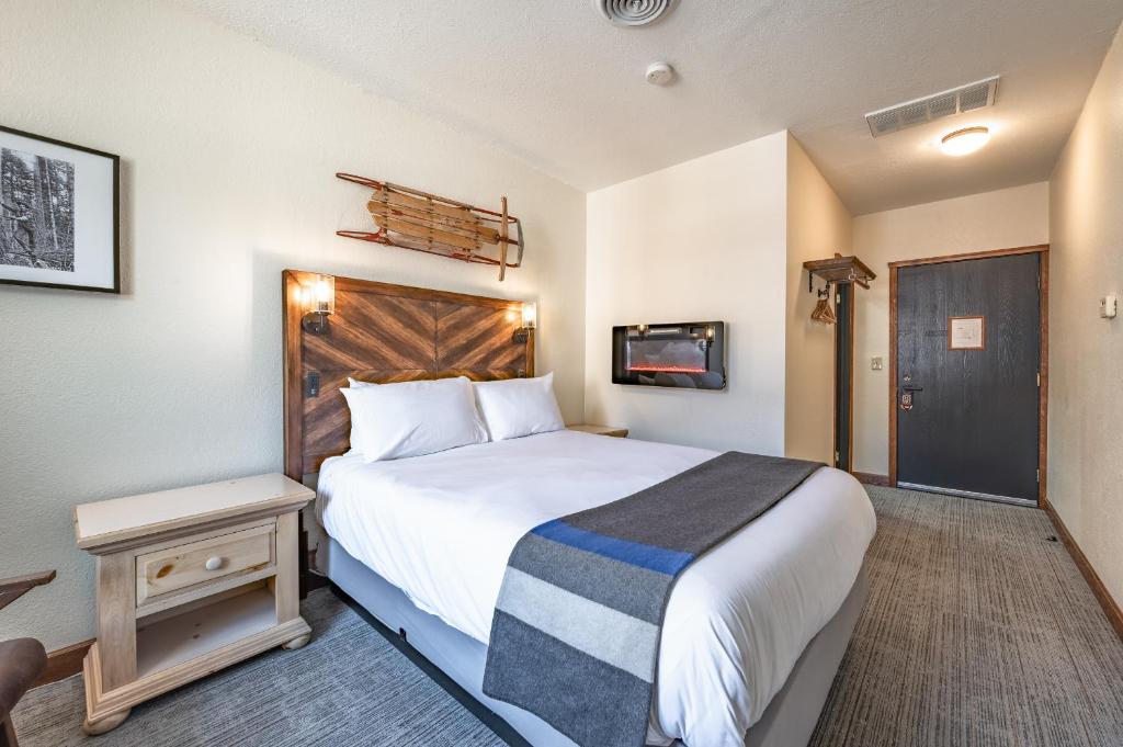 Postel nebo postele na pokoji v ubytování Hotel Leavenworth