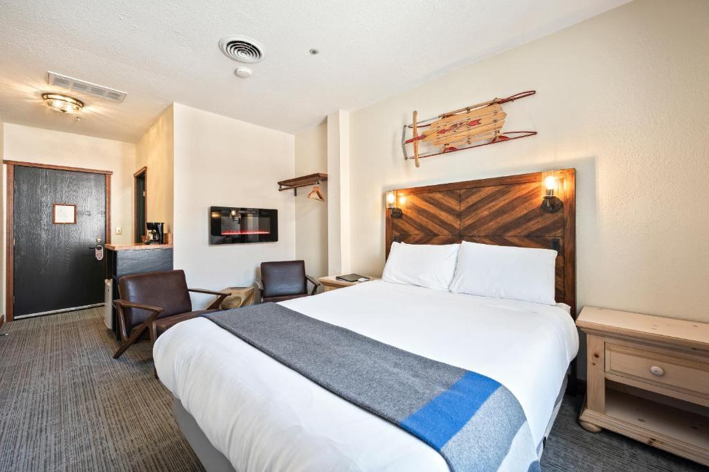 Postel nebo postele na pokoji v ubytování Hotel Leavenworth