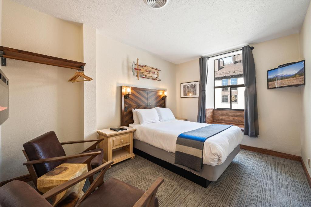 Postel nebo postele na pokoji v ubytování Hotel Leavenworth