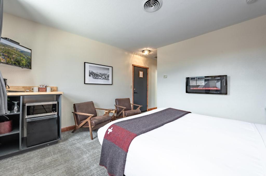 Postel nebo postele na pokoji v ubytování Hotel Leavenworth