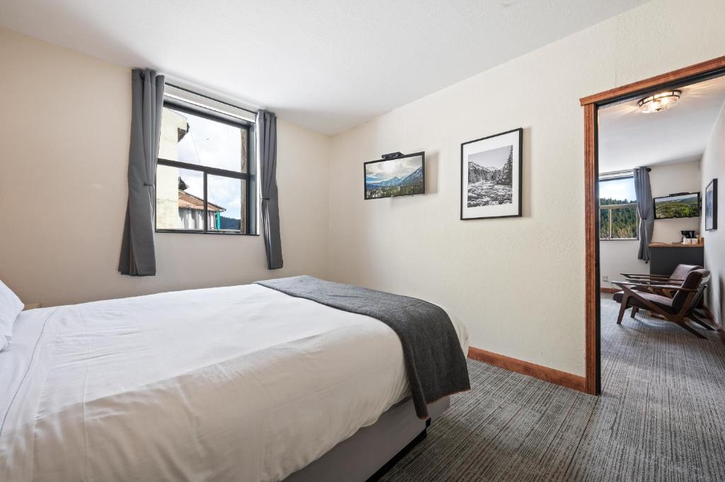 Postel nebo postele na pokoji v ubytování Hotel Leavenworth