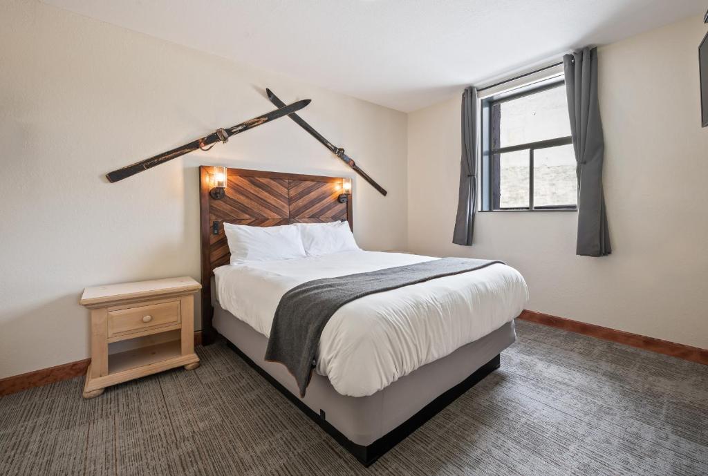 Postel nebo postele na pokoji v ubytování Hotel Leavenworth