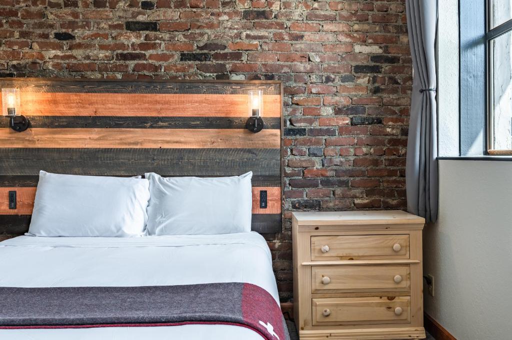 Postel nebo postele na pokoji v ubytování Hotel Leavenworth
