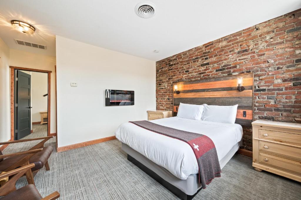 Postel nebo postele na pokoji v ubytování Hotel Leavenworth