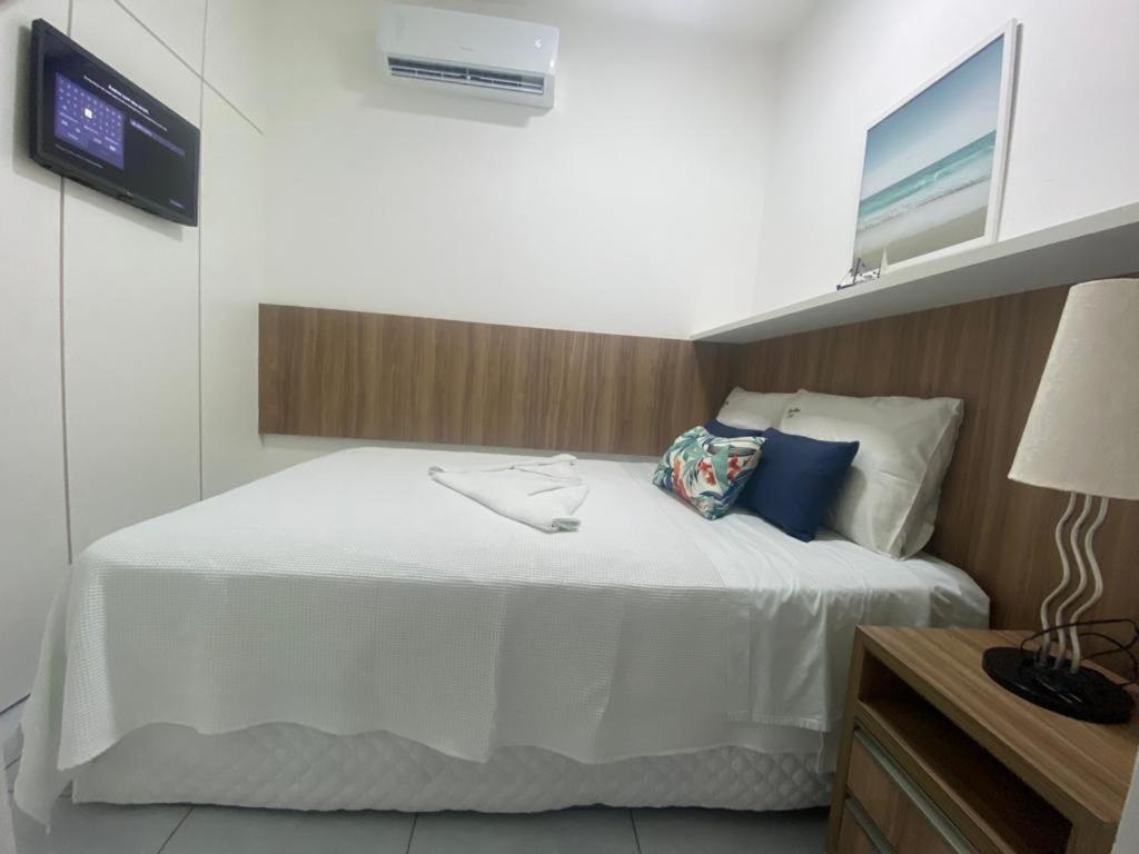 Postel nebo postele na pokoji v ubytování Pipa Ubaia 219 com solarium